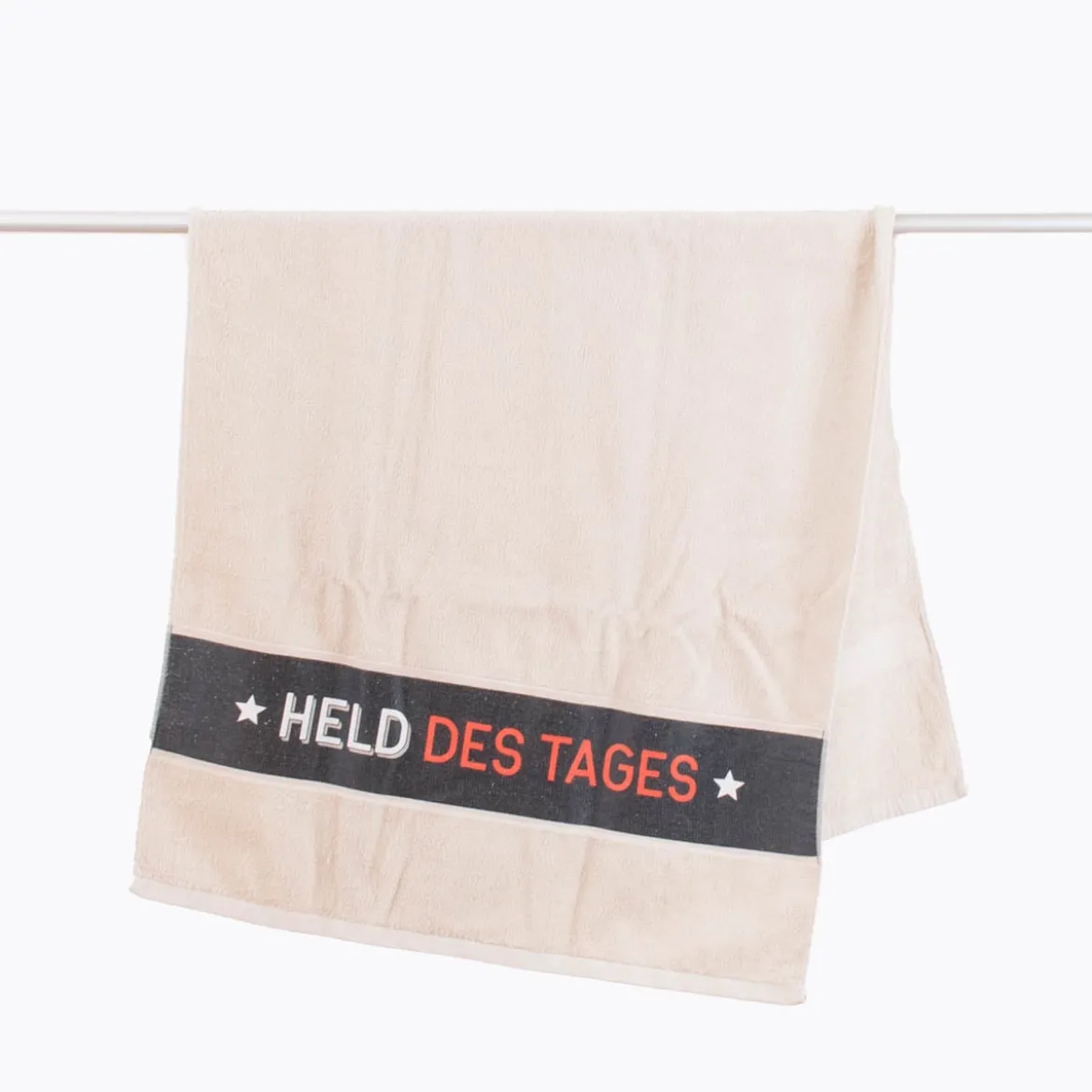 Badetuch aus Baumwolle Held des Tages beige schwarz weiß orange 70x140cm von La Vida