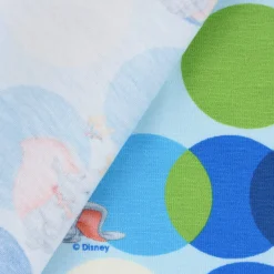 Baumwolljersey Digitaldruck Disney Dumbo Kreise blau grün creme 1,5m Breite