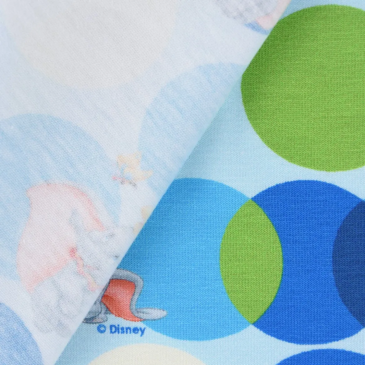 Baumwolljersey Digitaldruck Disney Dumbo Kreise blau grün creme 1,5m Breite