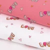Baumwolljersey Jerseystoff NEON LOVE Schrift Herzchen rosa pink 148cm Breite