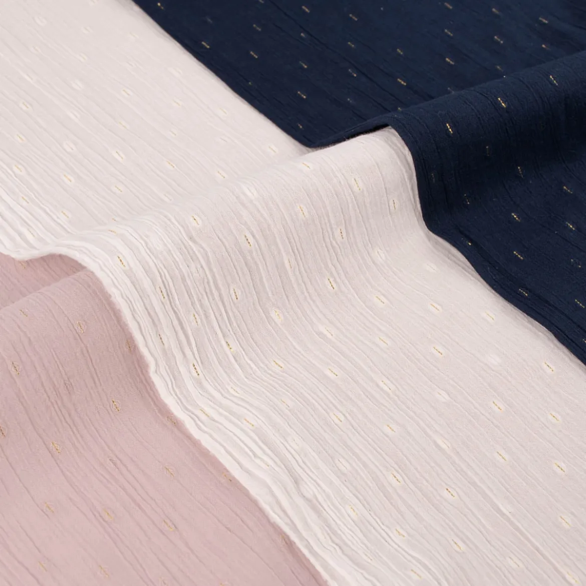 Baumwollstoff Crinkle Dobby Lurex rosa goldfarbig 1,35m Breite