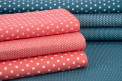 Baumwollstoff Mini Sterne koralle weiß 1,40m Breite