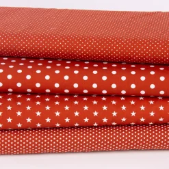 Baumwollstoff Sterne ca. 1x1cm terrakotta weiß 1,40m Breite