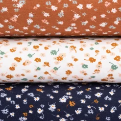 Bekleidungsstoff Modal Baumwolle Jersey Blumen Blüten weiß rosa cognac 1,50m Breite