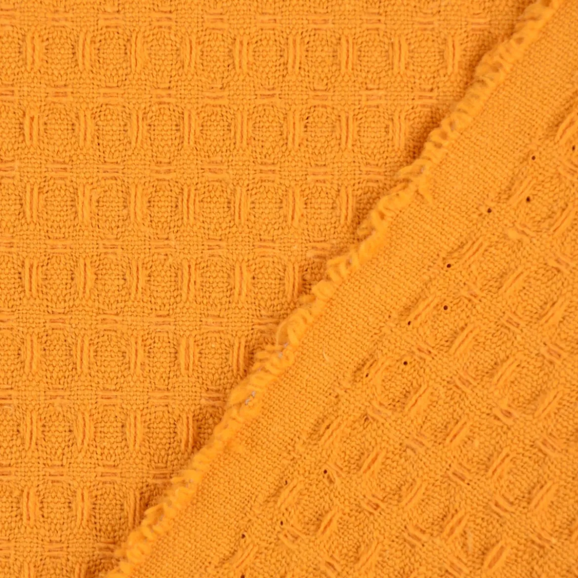 Bekleidungsstoff Waffelpique Baumwolle uni ocker gelb 1,45m Breite