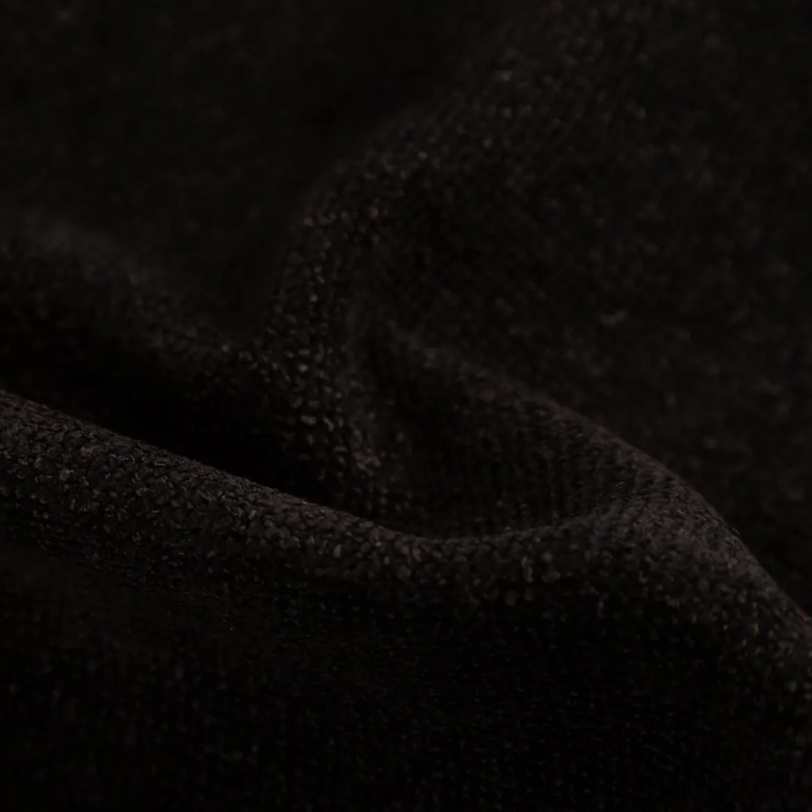 Boucle Polsterstoff mit Fleckschutz Petproof Doha schwarz meliert 1,45m Breite