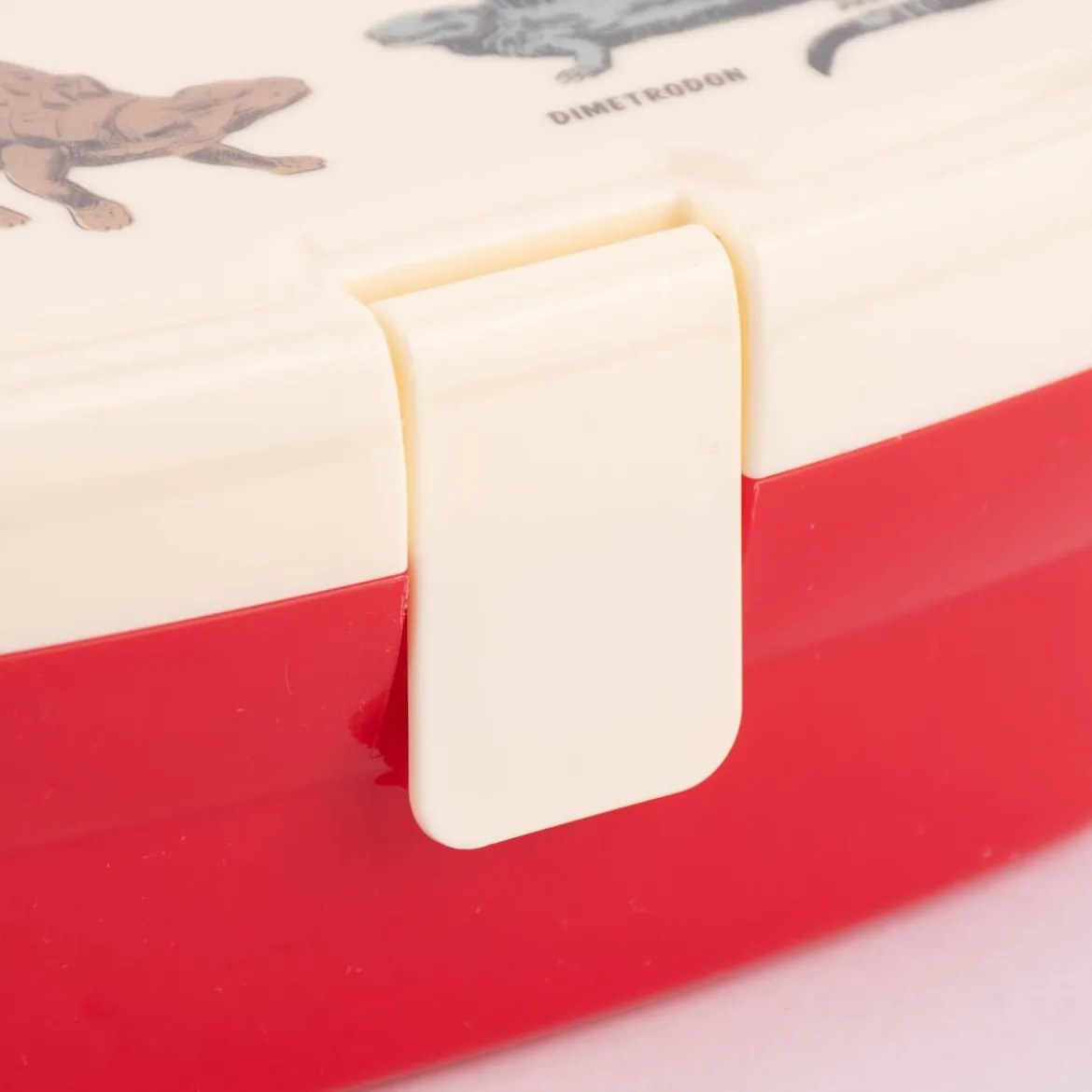 Brotzeit-Dose mit herausnehmbarem Fach Dinosaurier rot creme 17,5x13x7cm