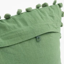Deko Kissen einfarbig strukturiert mit Pompons altgrün 30x50cm