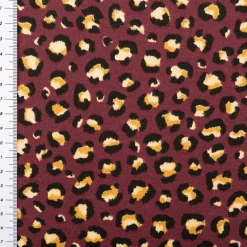 Dekostoff Halbpanama Leomuster Leoprint weinrot gold 1,40m Breite