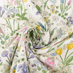 Dekostoff Halbpanama Rabbit Spring Fever Hasen Frühlingsblumen weiß bunt 1,40m Breite