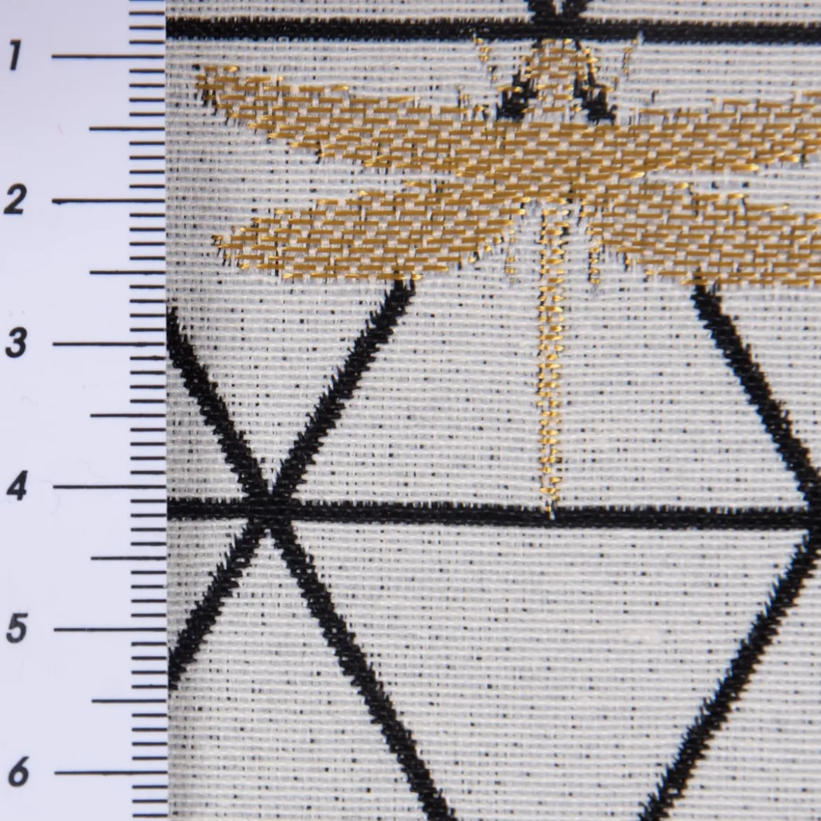 Dekostoff Jacquard-Stoff Dreiecke weiß schwarz Libelle gold 1,40m Breite