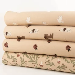 French Terry Krepp Stoff Baumwolle Marienkäfer beige rot 155cm
