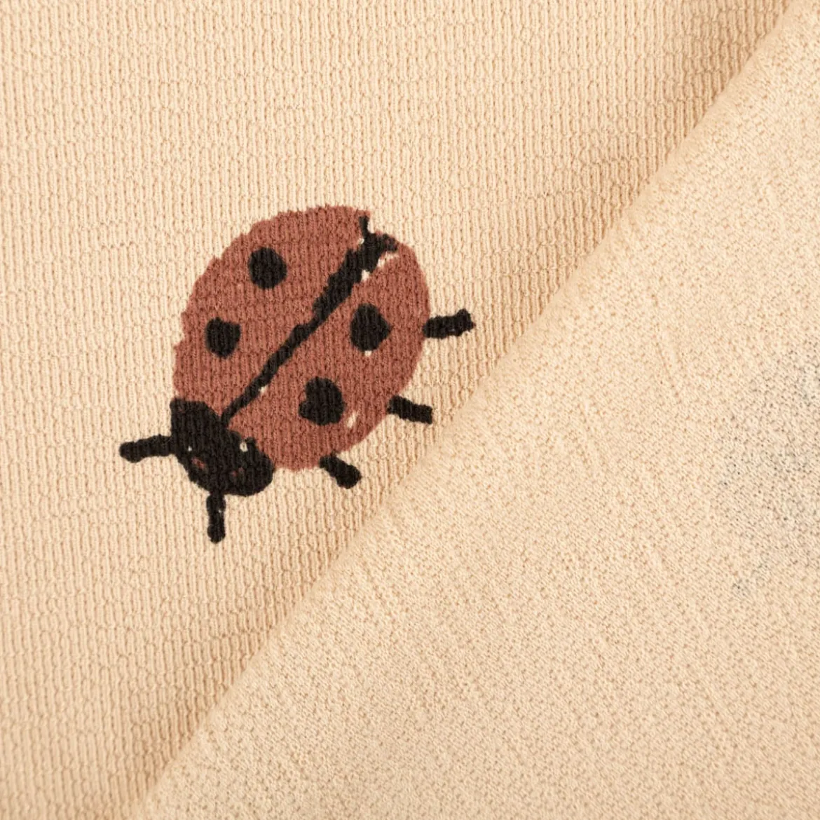 French Terry Krepp Stoff Baumwolle Marienkäfer beige rot 155cm