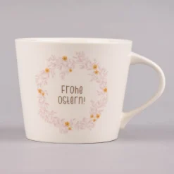 Grafik Werkstatt Goldtasse Frohe Ostern Blumenkranz weiß pastell goldfarbig 420ml