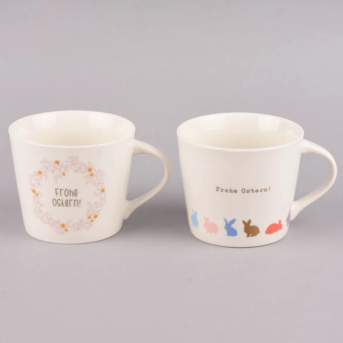 Grafik Werkstatt Goldtasse Frohe Ostern Blumenkranz weiß pastell goldfarbig 420ml