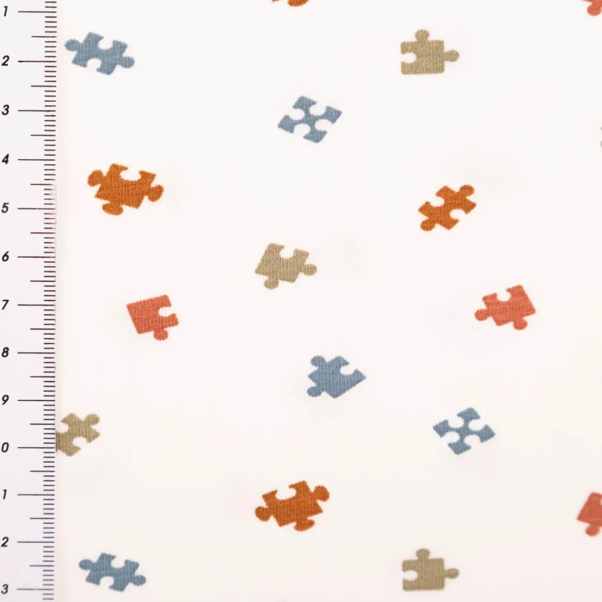 Jersey Stoff Baumwolljersey Puzzle wollweiß bunt 1,50m Breite