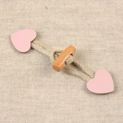 Knebelverschluß Herz für Kinder rosa natur 2,4x10cm
