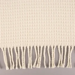 Kuscheldecke mit Waffelstruktur und Fransen creme 150x200cm