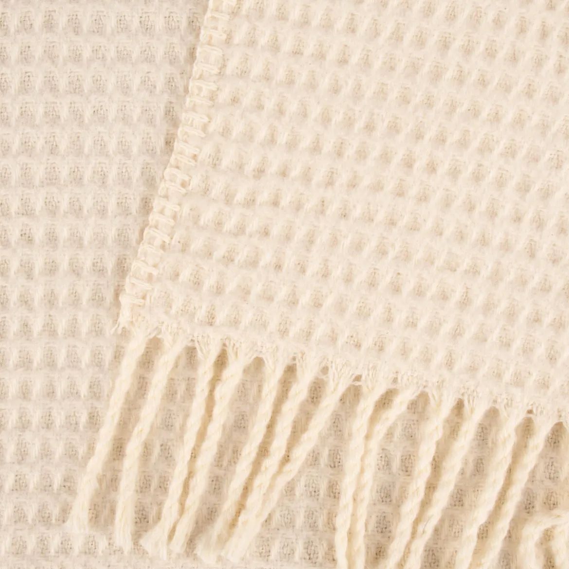 Kuscheldecke mit Waffelstruktur und Fransen creme 150x200cm