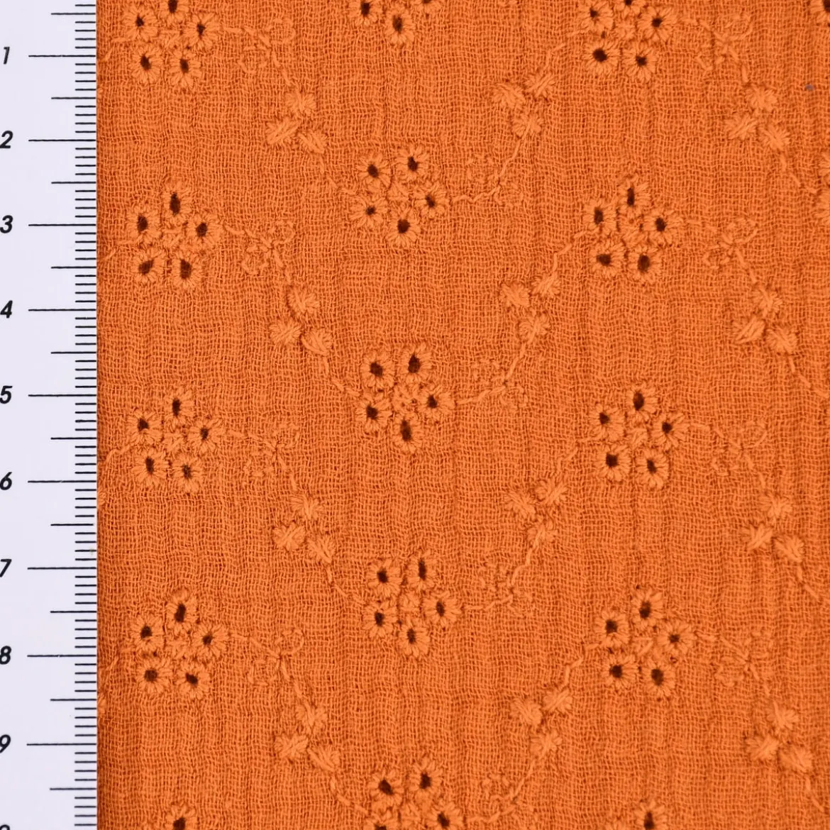 Musselin Stoff Baumwolle Lochstickerei Blumen Ranken einfarbig orange 1,20m Breite