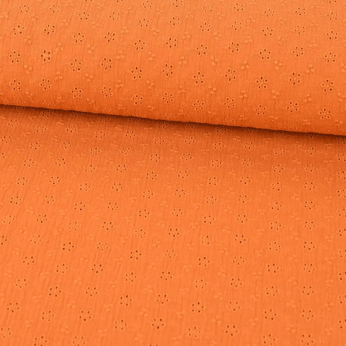 Musselin Stoff Baumwolle Lochstickerei Blumen Ranken einfarbig orange 1,20m Breite