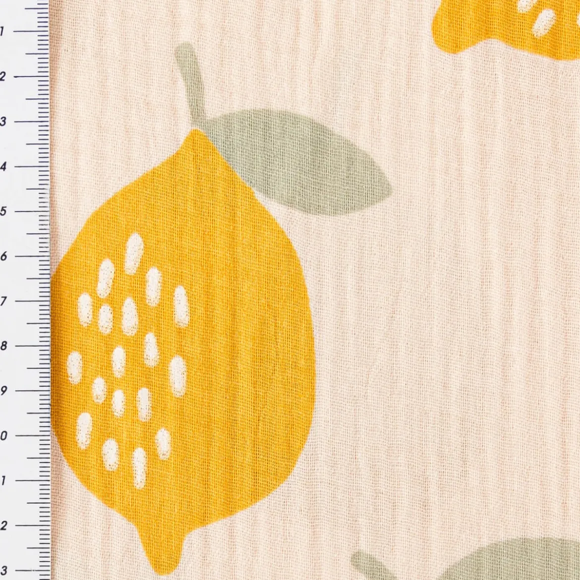 Musselin Stoff LEMONS Zitronen groß beige gelb 1,35m Breite