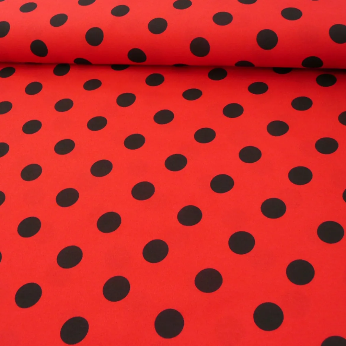 Polyester Punkte groß rot schwarz 1,5m Breite