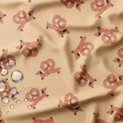 Polyester Stoff beschichtet wasserabweisend Alsachien Dackel Brezel beige karamell 1,40m Breite