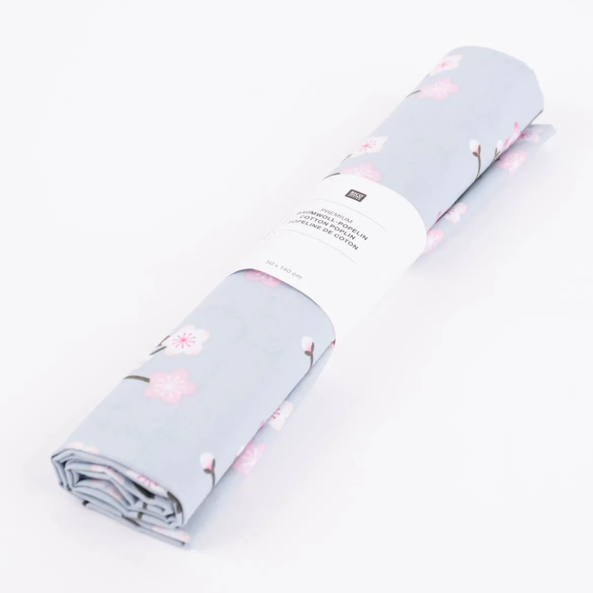 Rico Design Baumwollstoff Stoffabschnitt Kirschblütenzweige hellblau rosa 50x140cm