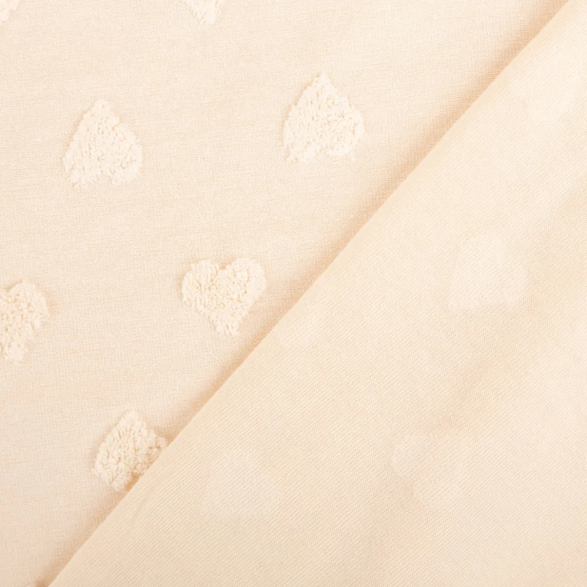 Strickstoff Feinstrick Baumwolle 3D Herzchen beige 160cm Breite