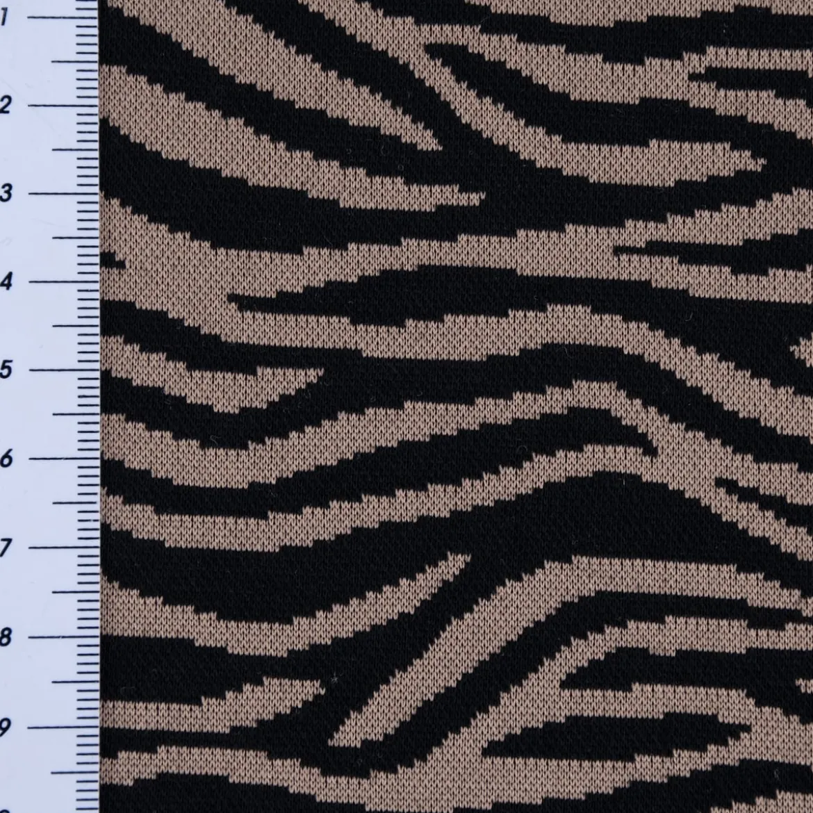 Strickstoff Jacquard Tigermuster beige schwarz 1,51m Breite