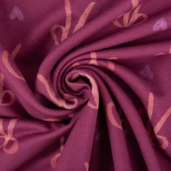 Sweatstoff aus Baumwolle Digitaldruck Schleifen fuchsia 1,50m Breite