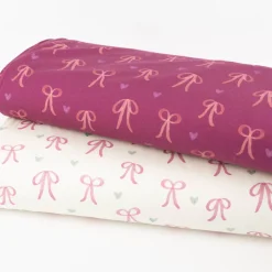 Sweatstoff aus Baumwolle Digitaldruck Schleifen fuchsia 1,50m Breite