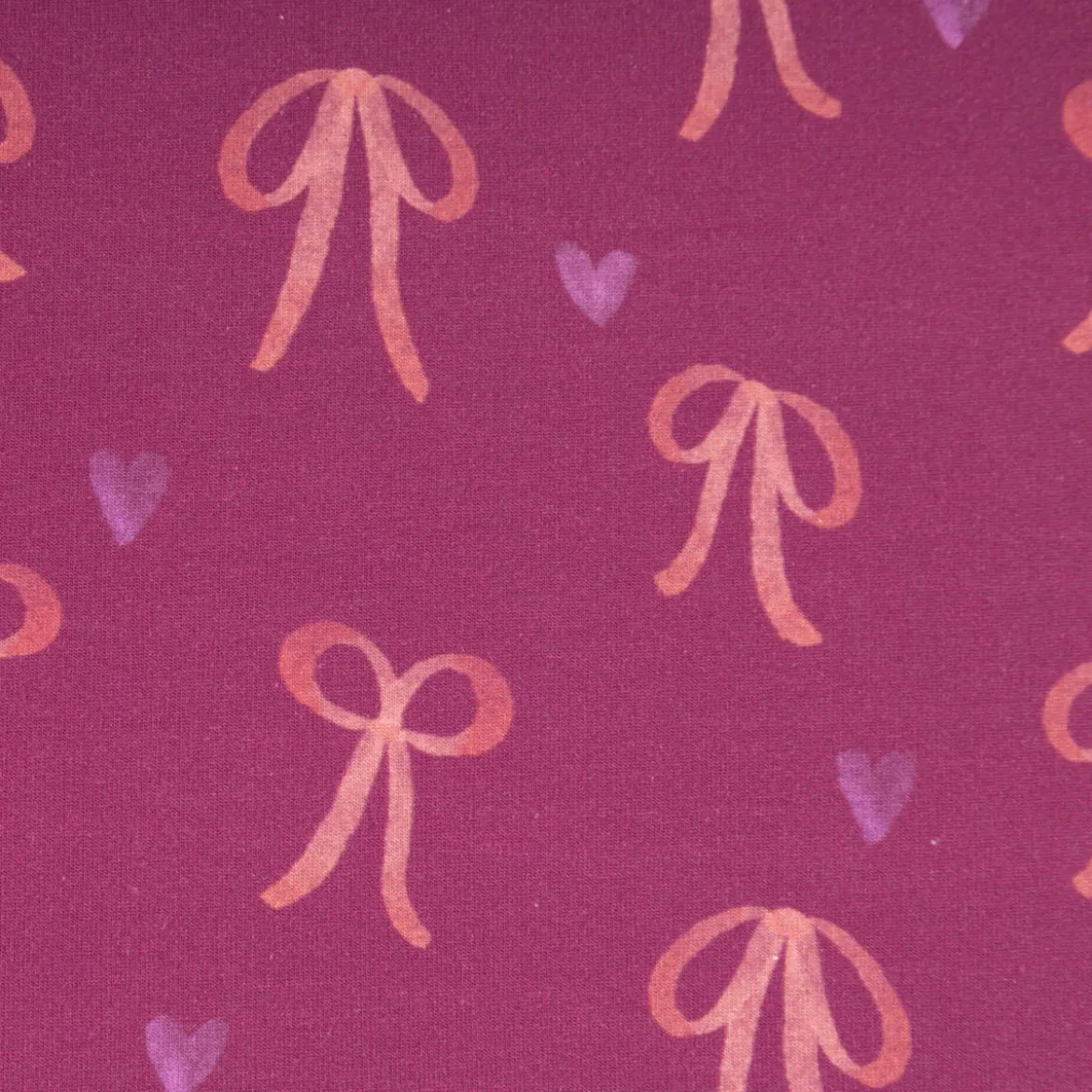 Sweatstoff aus Baumwolle Digitaldruck Schleifen fuchsia 1,50m Breite