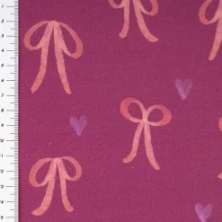 Sweatstoff aus Baumwolle Digitaldruck Schleifen fuchsia 1,50m Breite