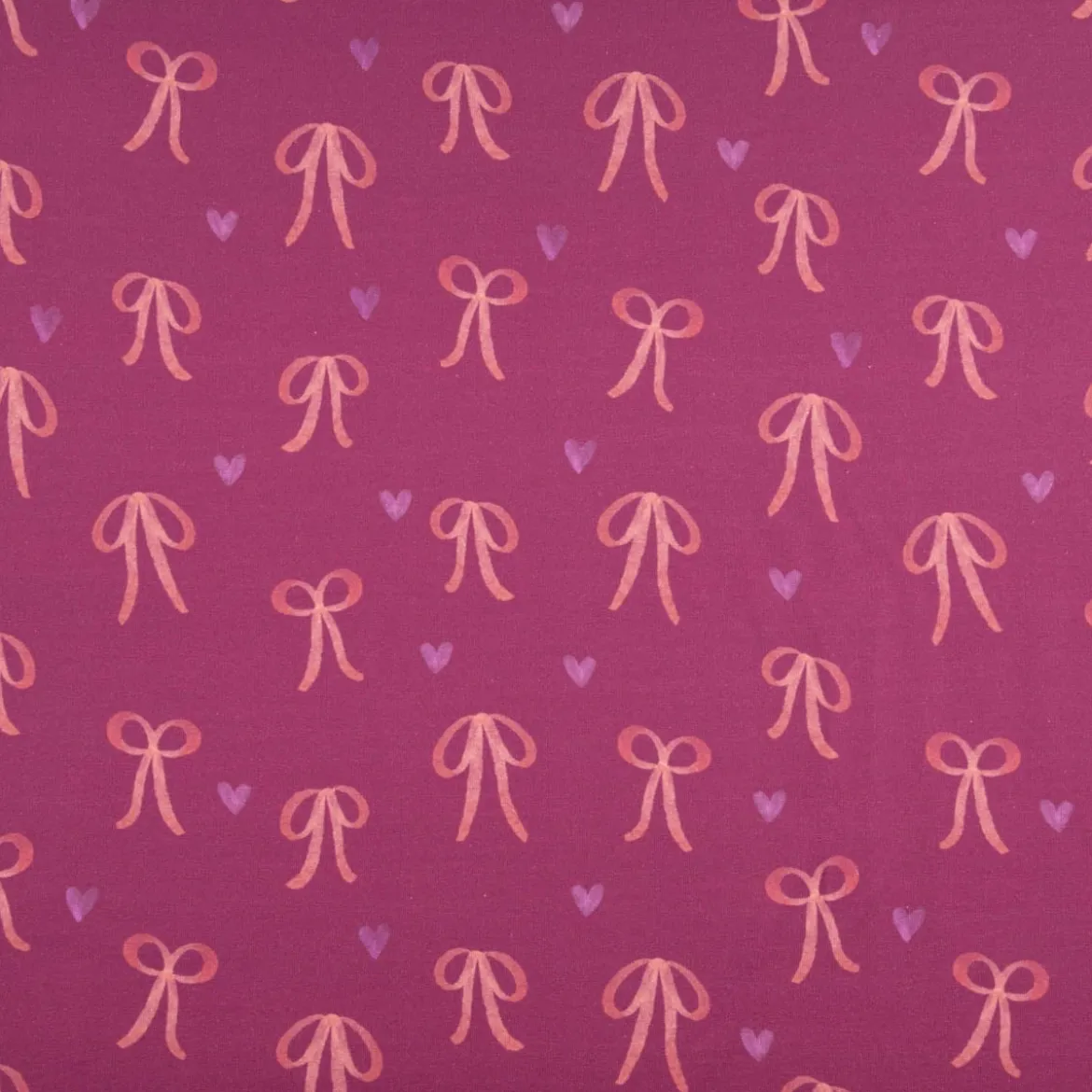 Sweatstoff aus Baumwolle Digitaldruck Schleifen fuchsia 1,50m Breite