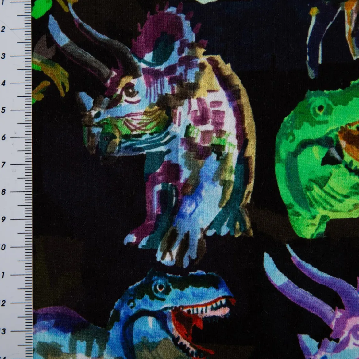 Sweatstoff Dinosaurier Digitaldruck schwarz, grün, blau, orange 1,40m Breite