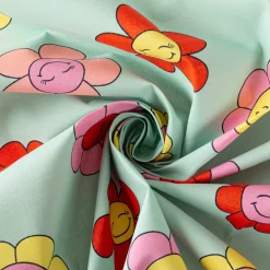 Tischdeckenstoff abwaschbar Baumwollstoff beschichtet HAPPY FLOWERS lachende Blumen mint grün rosa gelb 1,45m Breite