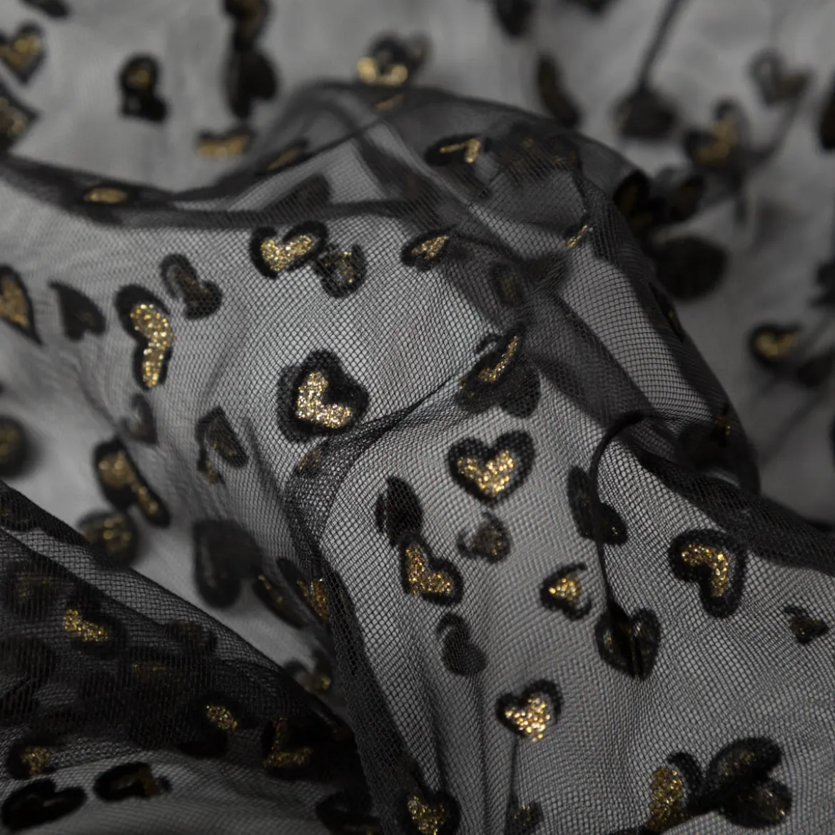Tüllstoff Softtüll Flock Hearts Gitzerherzchen schwarz goldfarbig 1,50m Breite