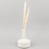 Vase aus Porzellan mit Henkel creme 14x19cm