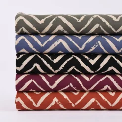 Viskosestoff Bekleidungsstoff Radiance Chevronmuster ZIG ZAG rostrot beige 1,40m Breite