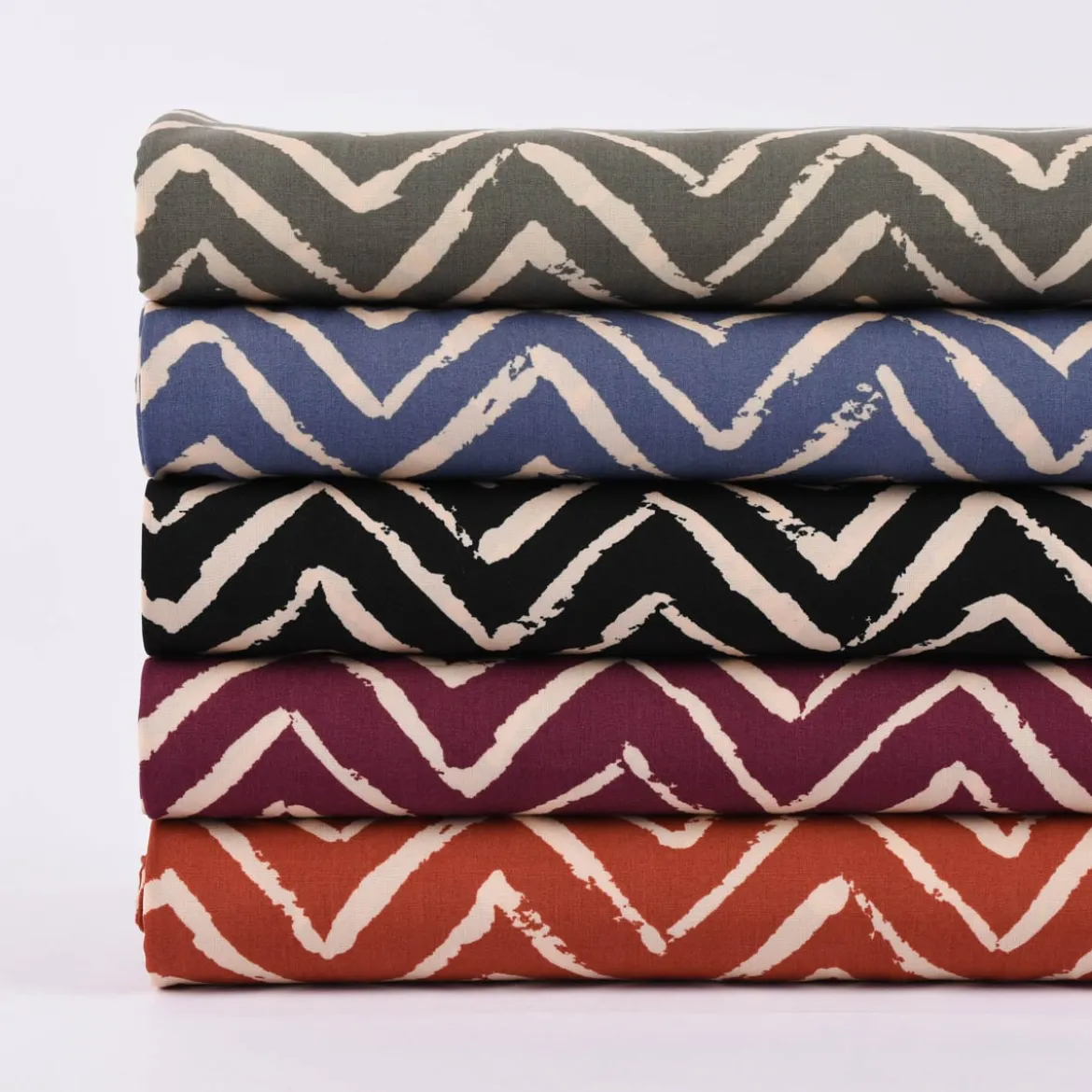 Viskosestoff Bekleidungsstoff Radiance Chevronmuster ZIG ZAG rostrot beige 1,40m Breite