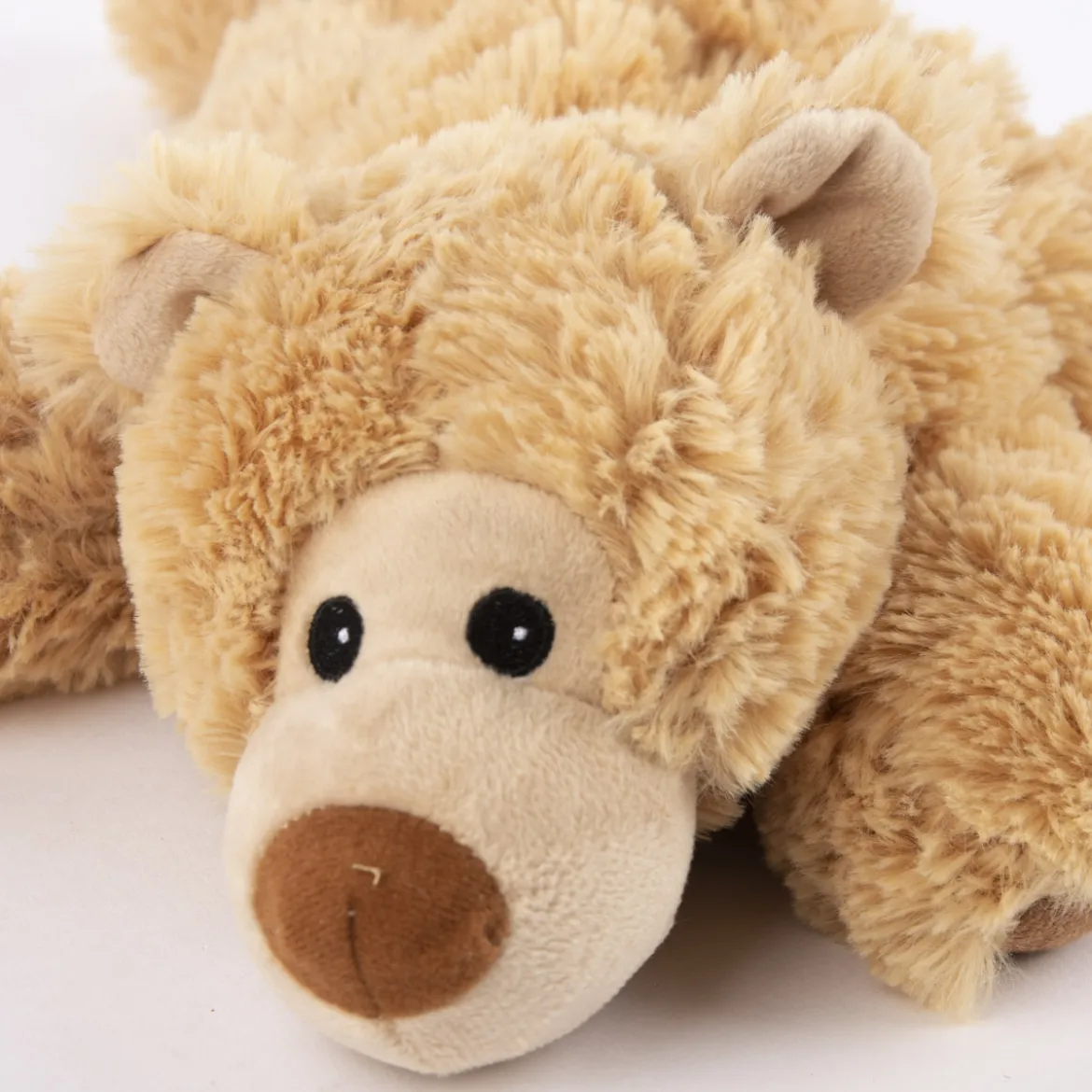 Warmies Wärmestofftier liegender Bär beige 100% Hirse-Lavendelfüllung