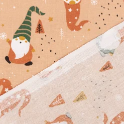 Weihnachtsstoff Baumwollstoff Webware Gnome Weihnachtswichtel lachsrosa 1,47m Breite